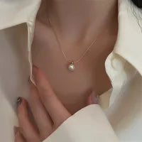 Radiant Pearl Circle Necklace