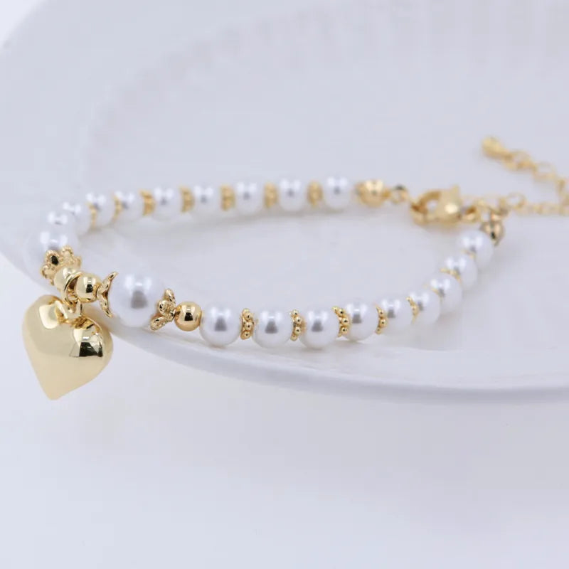Serenelle Pearl & Heart Charm Bracelet