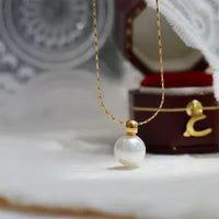 Radiant Pearl Circle Necklace